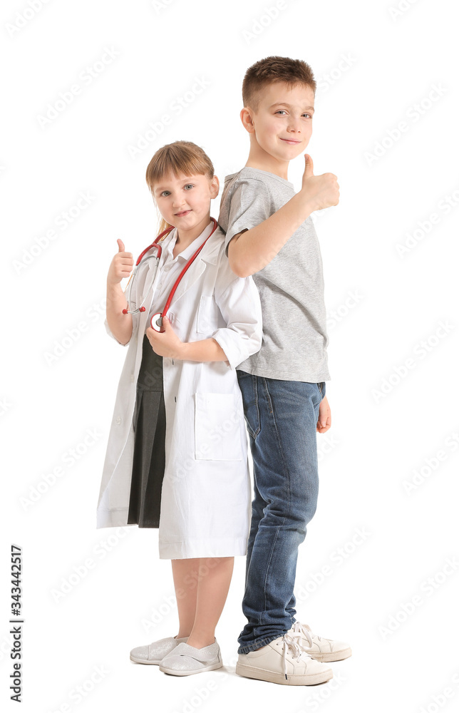 Cute little doctor with patient showing thumb-up gesture on white background