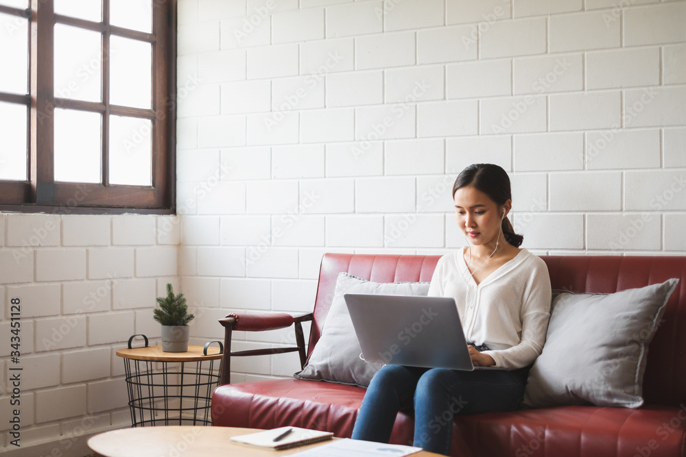 ..Work from home or work at home concept, asian woman working with laptop computer at home