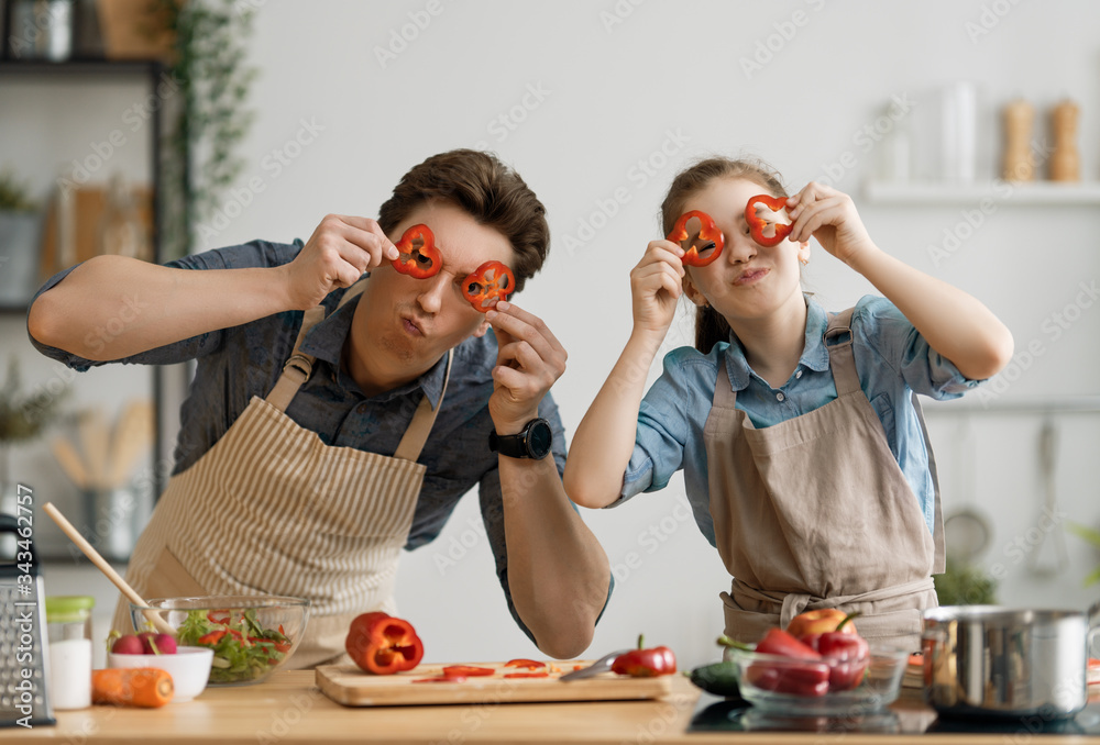 Happy family in the kitchen.