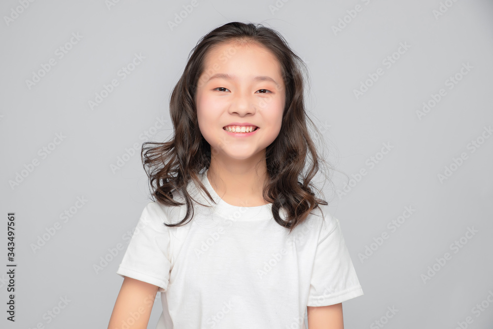 Asian primary school girls in gray background