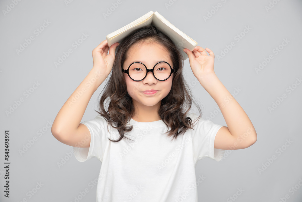 Asian primary school girls in gray background