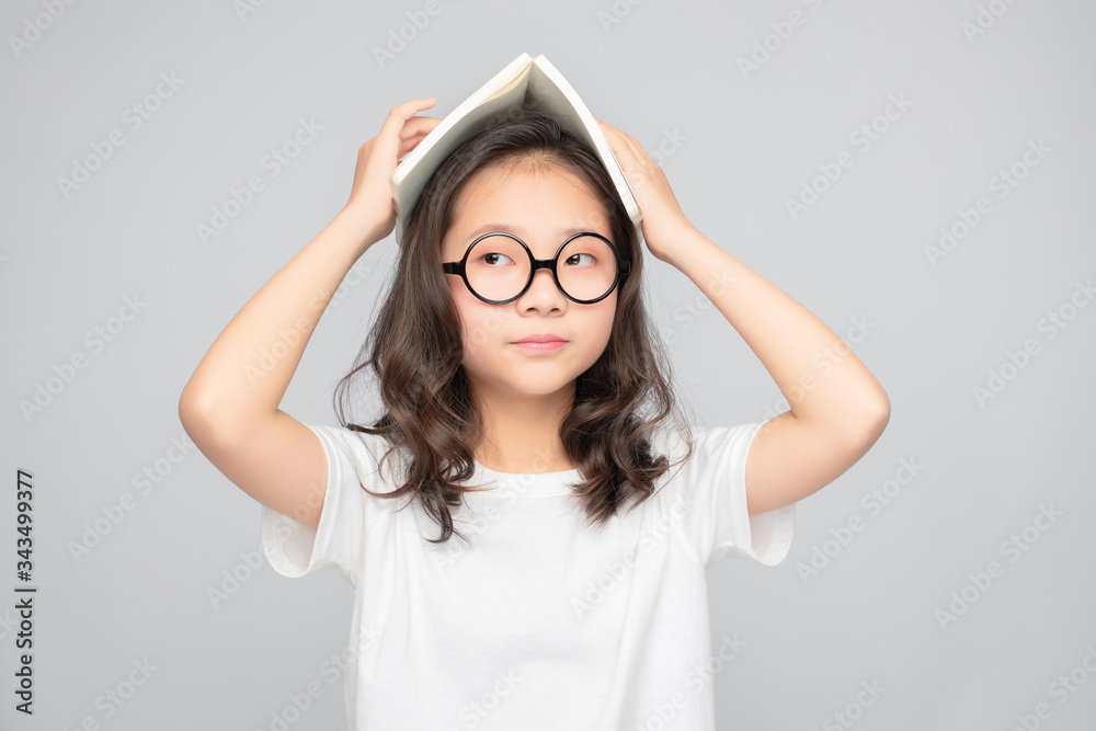 Asian primary school girls in gray background