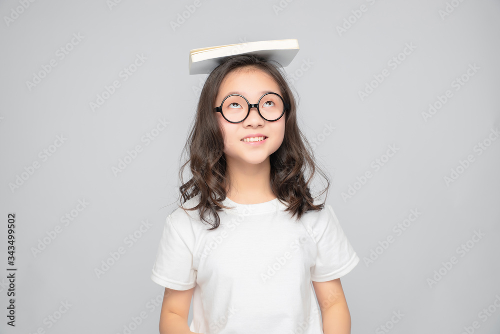 Asian primary school girls in gray background