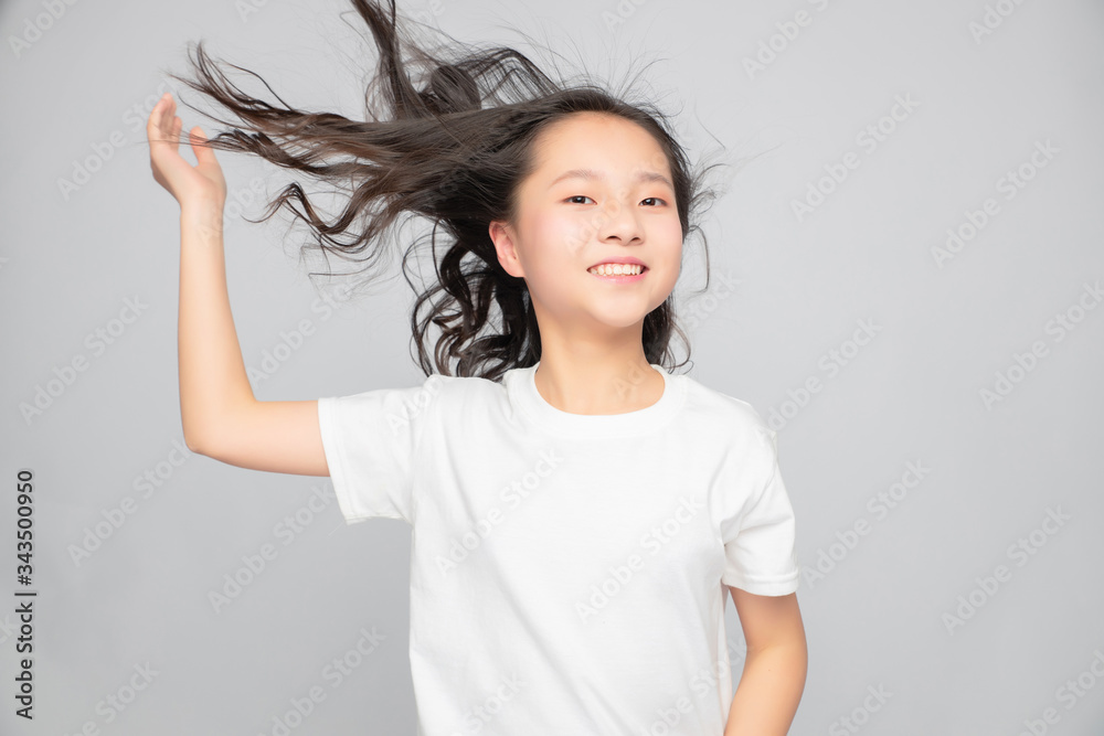 Asian primary school girls in gray background