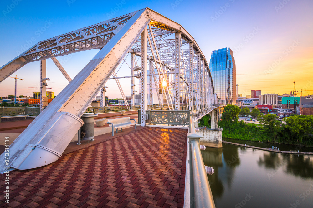 Nashville, Tennessee, USA downtown skyline on the Cumberland River.