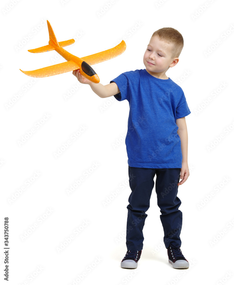 Boy with toy plane