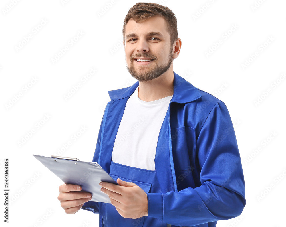 Male truck driver with documents on white background