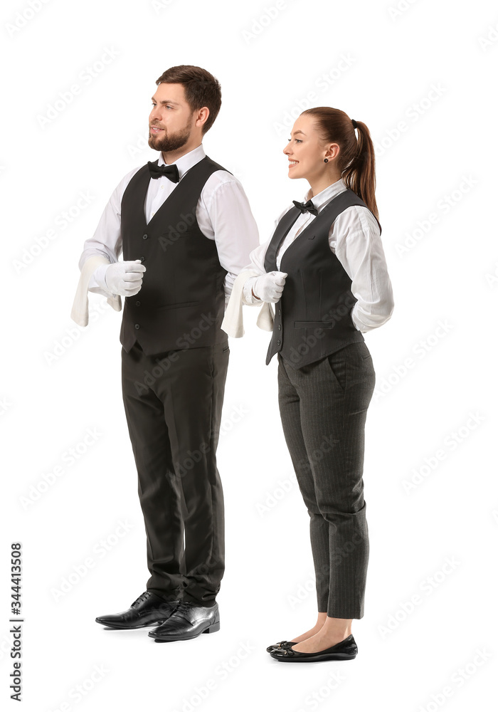 Male and female waiters on white background