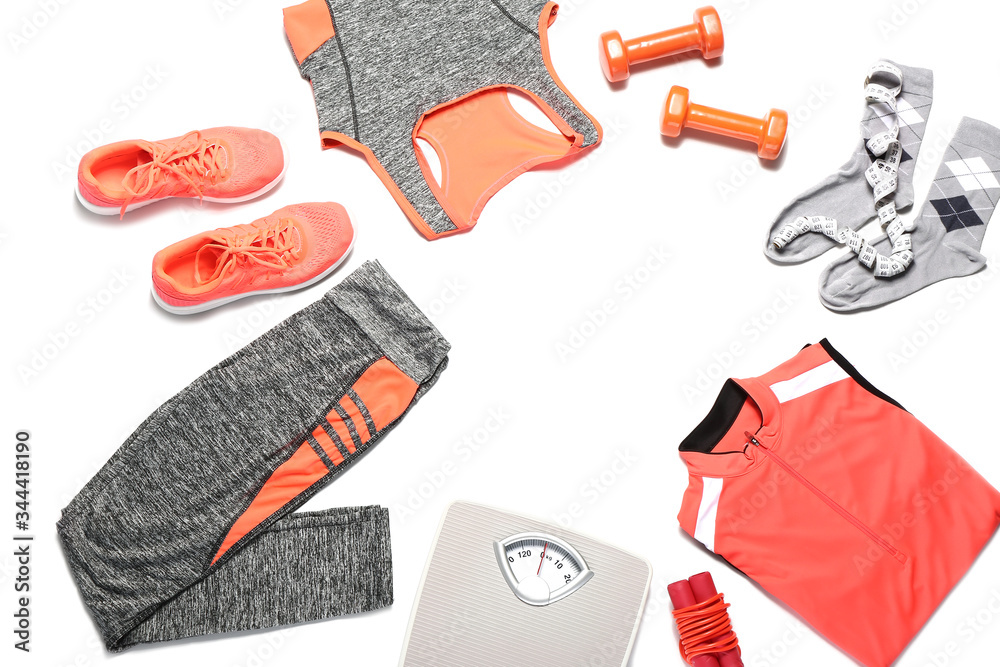 Sportswear and accessories on white background