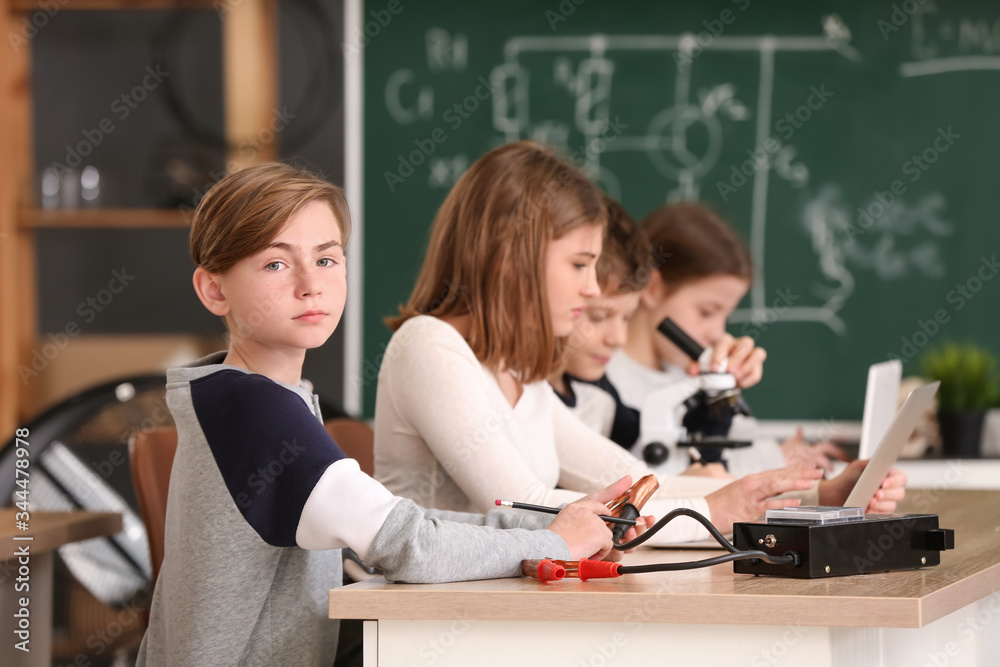 Pupils at physics lesson in classroom