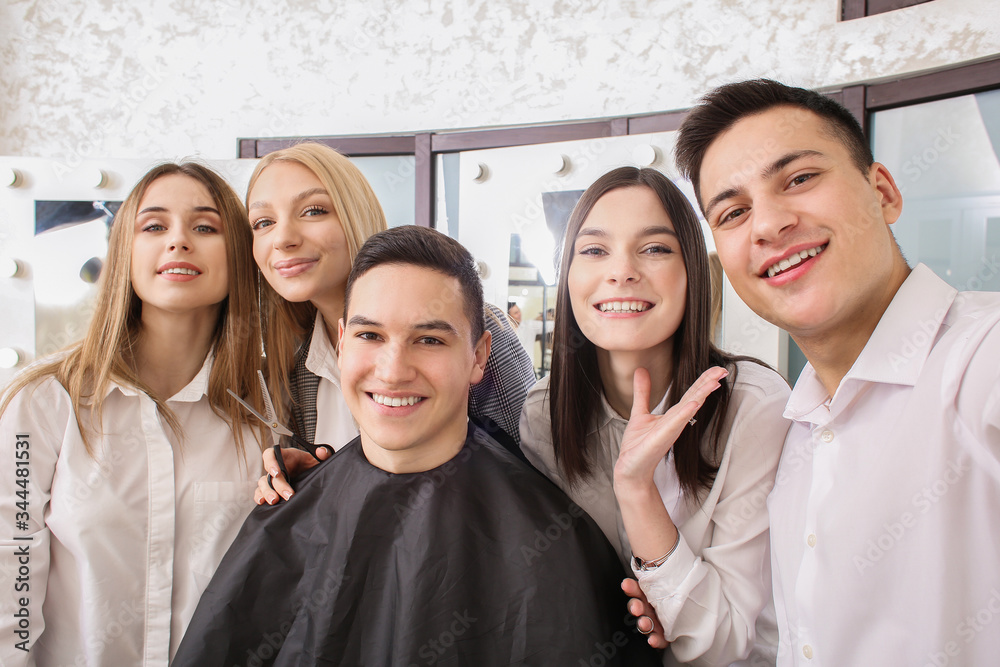 Young people during professional courses in hairdressers salon