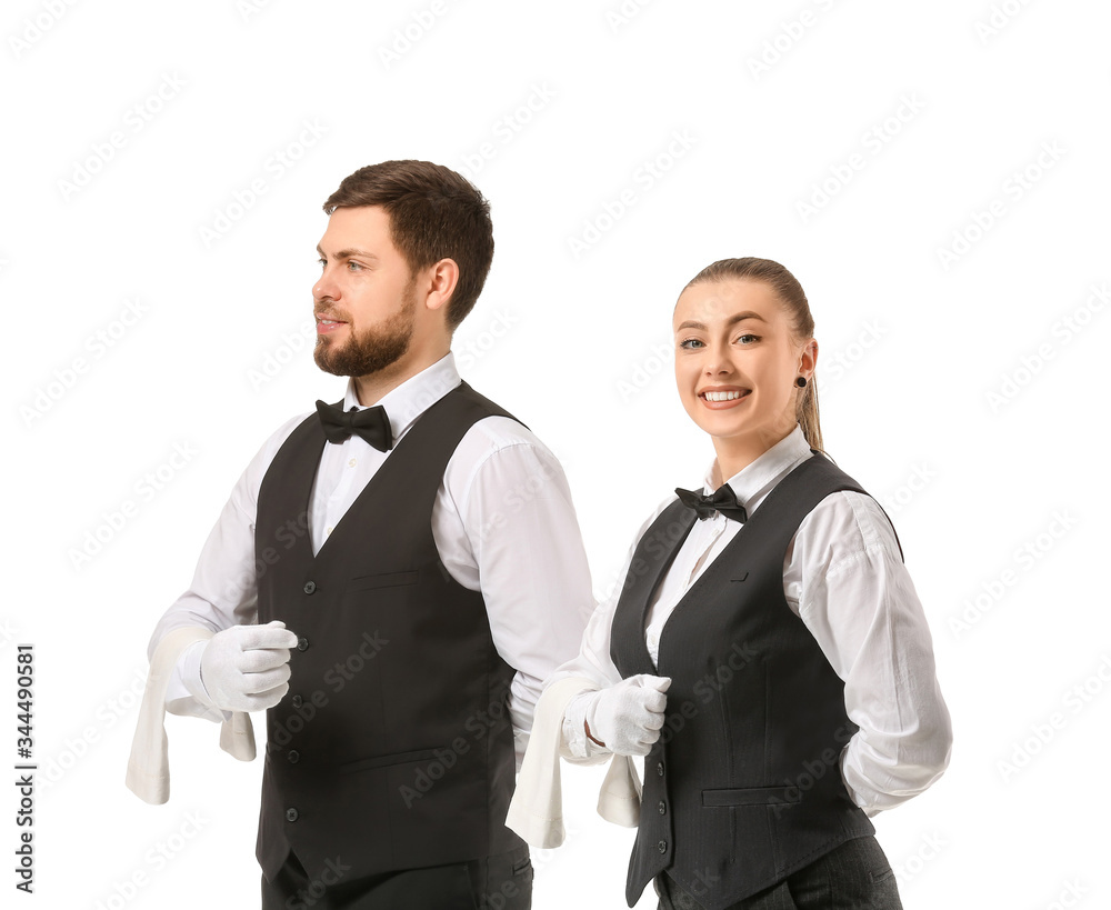 Male and female waiters on white background