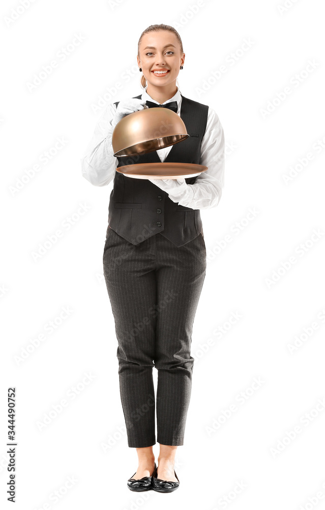 Beautiful female waiter with tray and cloche on white background