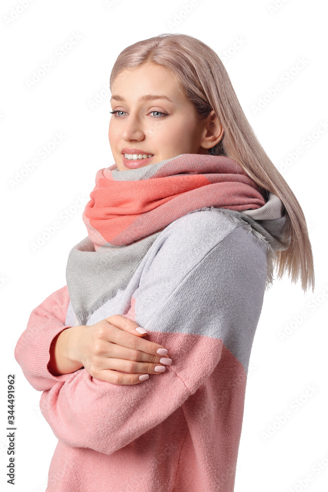 Beautiful young woman with stylish scarf on white background