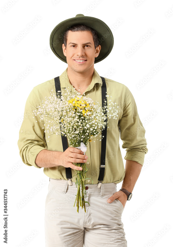 Handsome man with bouquet of flowers on white background