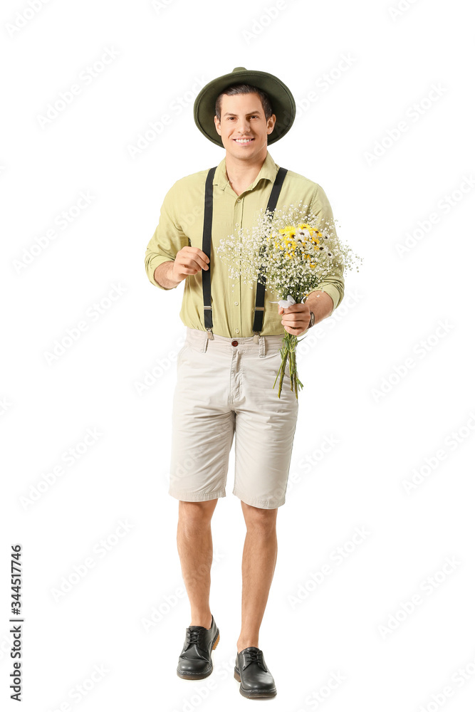 Handsome man with bouquet of flowers on white background