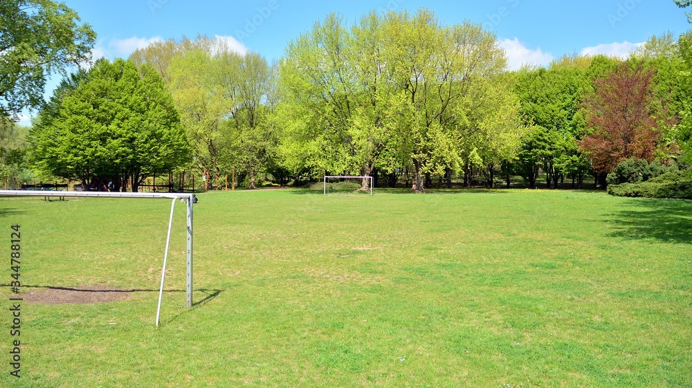 Empty football field in a city park.