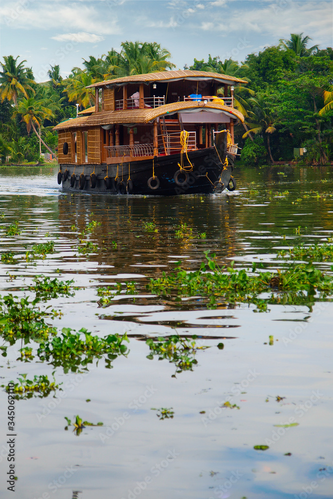 houseboat in the backwater at allepey, in the kerala-India 