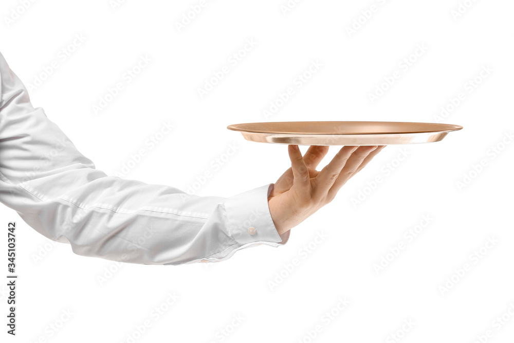 Handsome male waiter with empty tray on white background