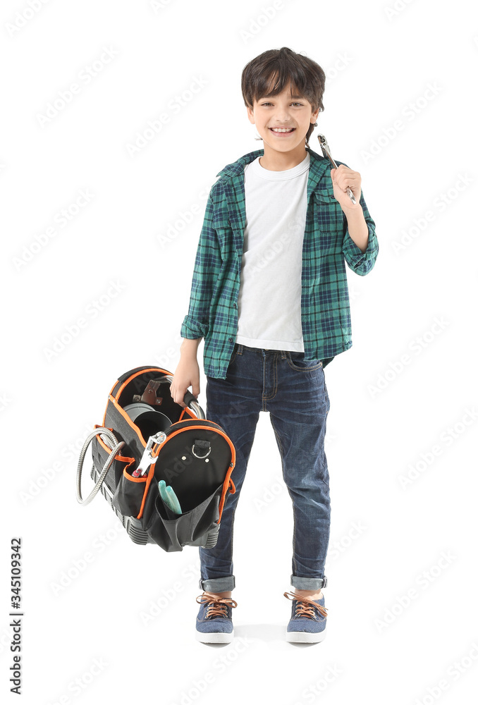 Portrait of little plumber on white background