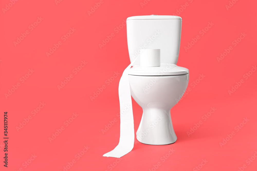 Toilet bowl with roll of paper on color background