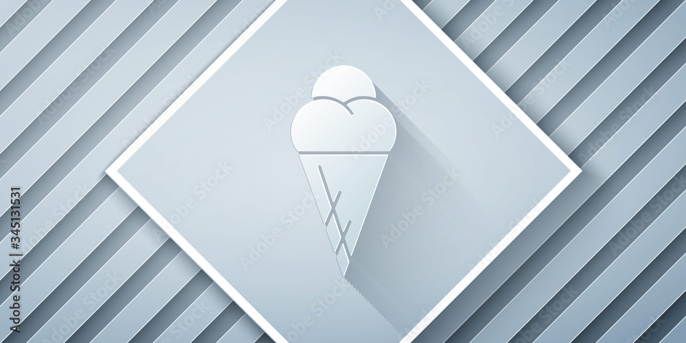 Paper cut Ice cream in waffle cone icon isolated on grey background. Sweet symbol. Paper art style. 