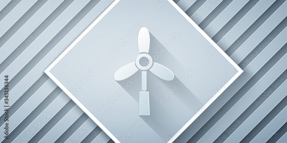 Paper cut Wind turbine icon isolated on grey background. Wind generator sign. Windmill for electric 