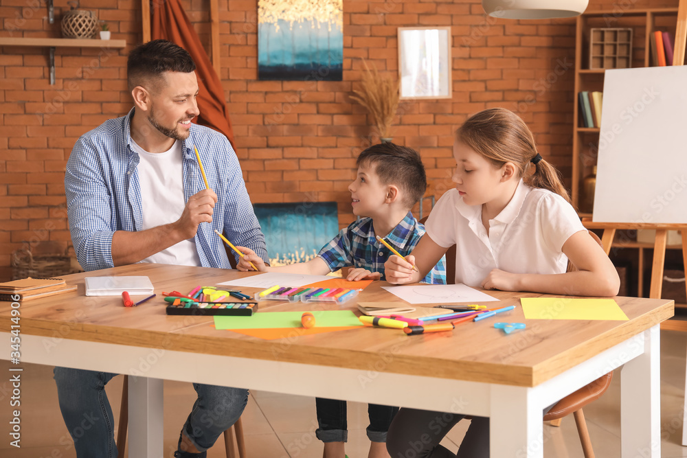 Drawing teacher giving optional classes at school