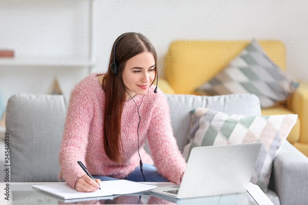 Female technical support agent working at home