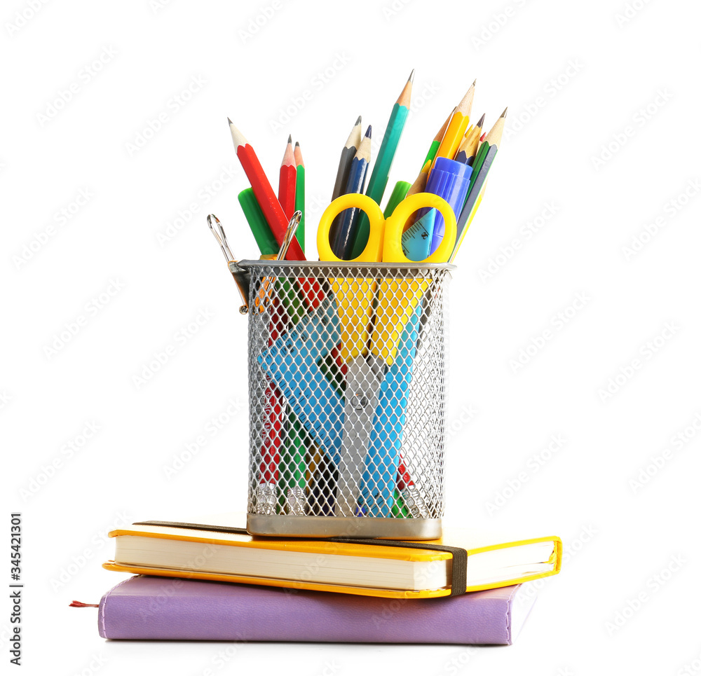 Holder with stationery on white background