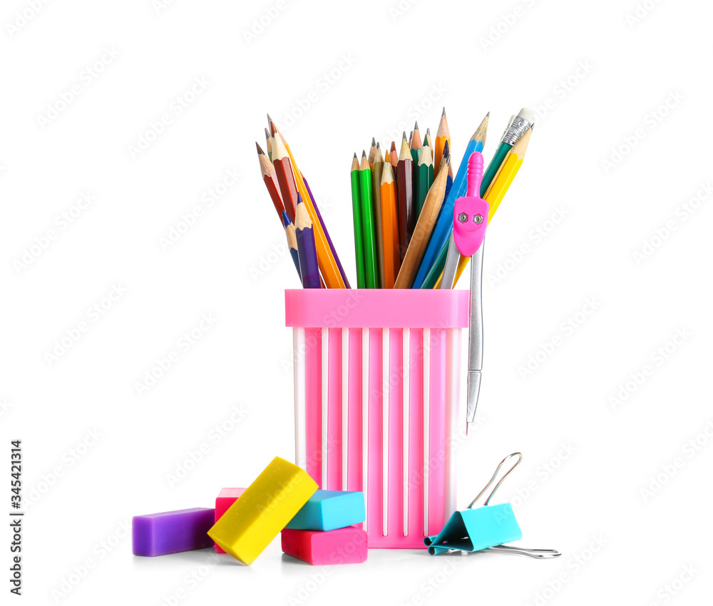 Holder with stationery on white background