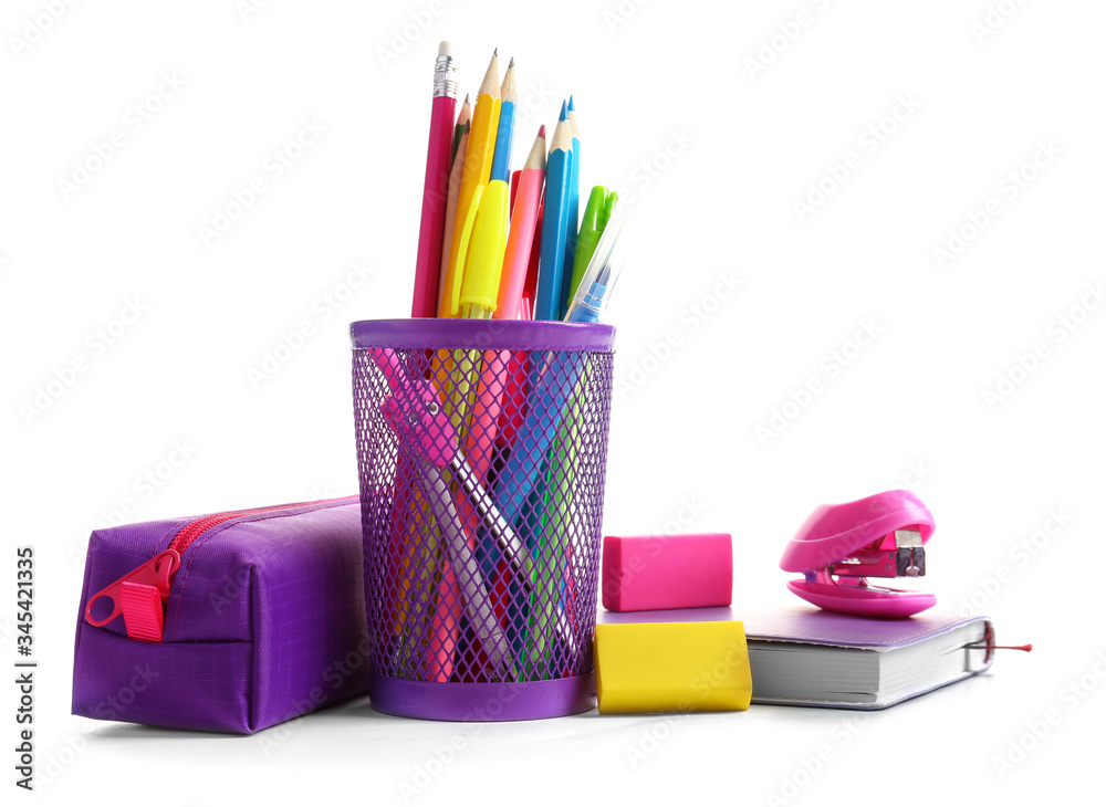 Holder with stationery on white background