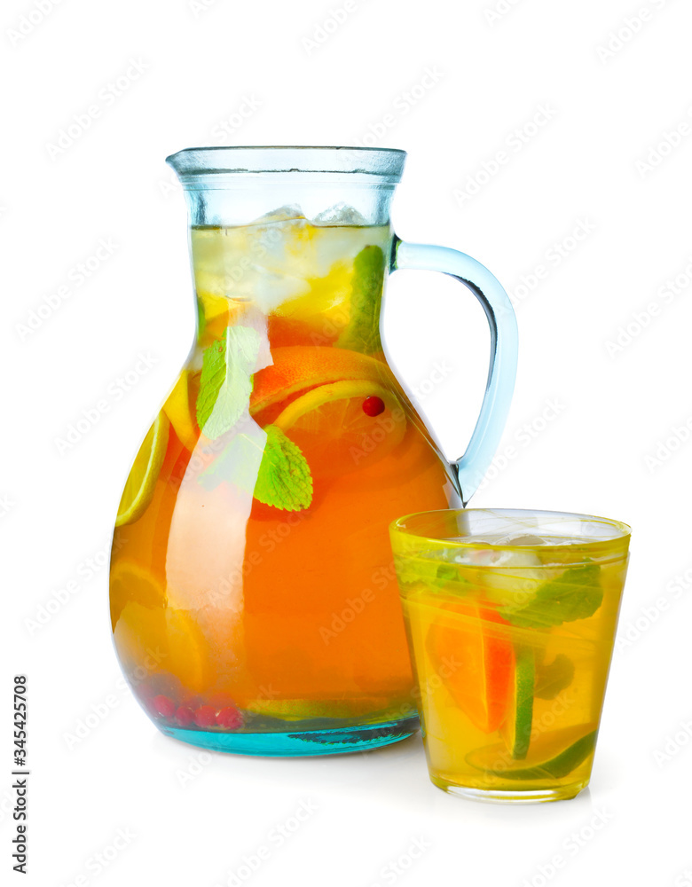 Jug of tasty cold tea on white background