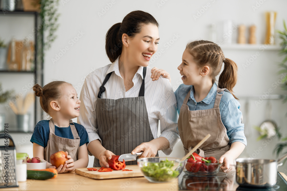 Happy family in the kitchen.