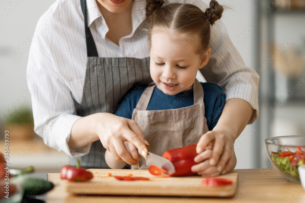 Happy family in the kitchen.