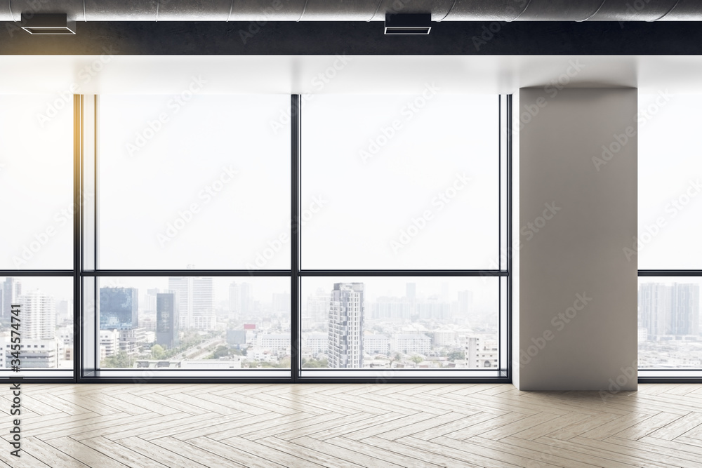 Light empty office interior with panoramic city view