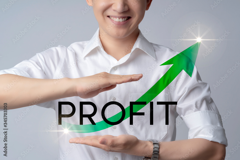 Closeup business asian man smile with hand gesture protect profit word text with green chart arrow r