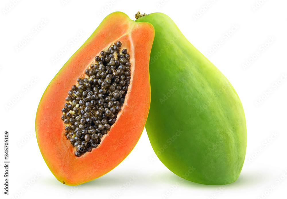 Isolated papaya. Two halves of green papaya fruit isolated on white background