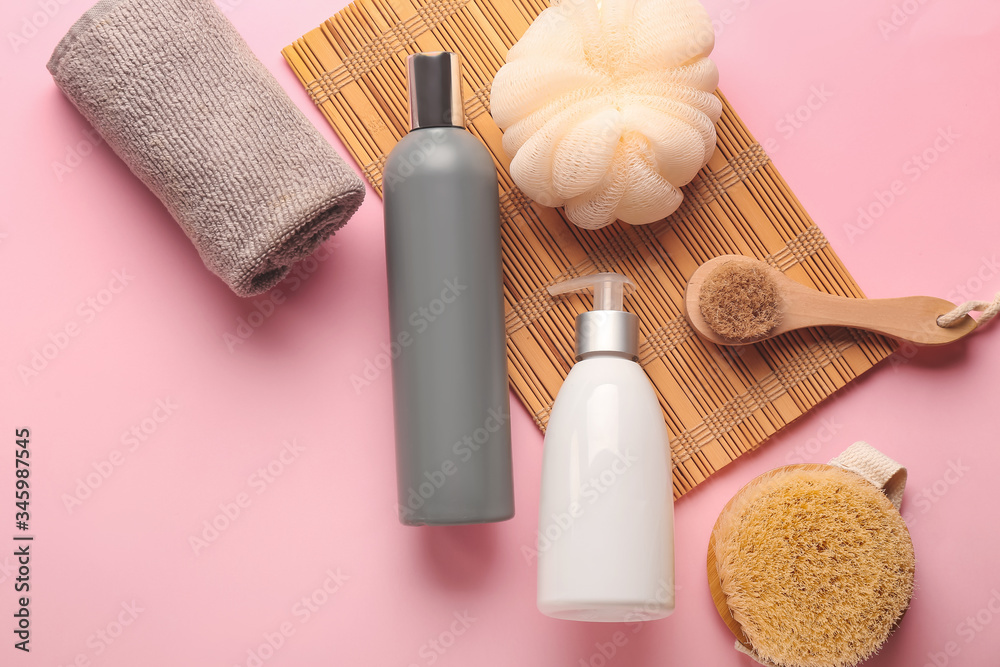 Set of bath accessories on color background