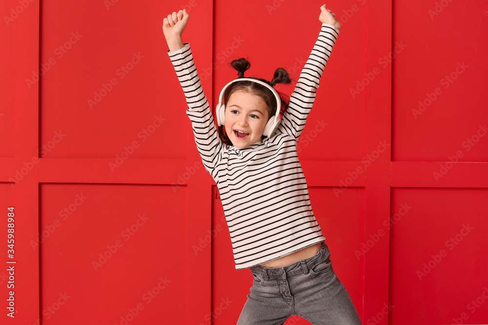 Cute dancing girl on color background