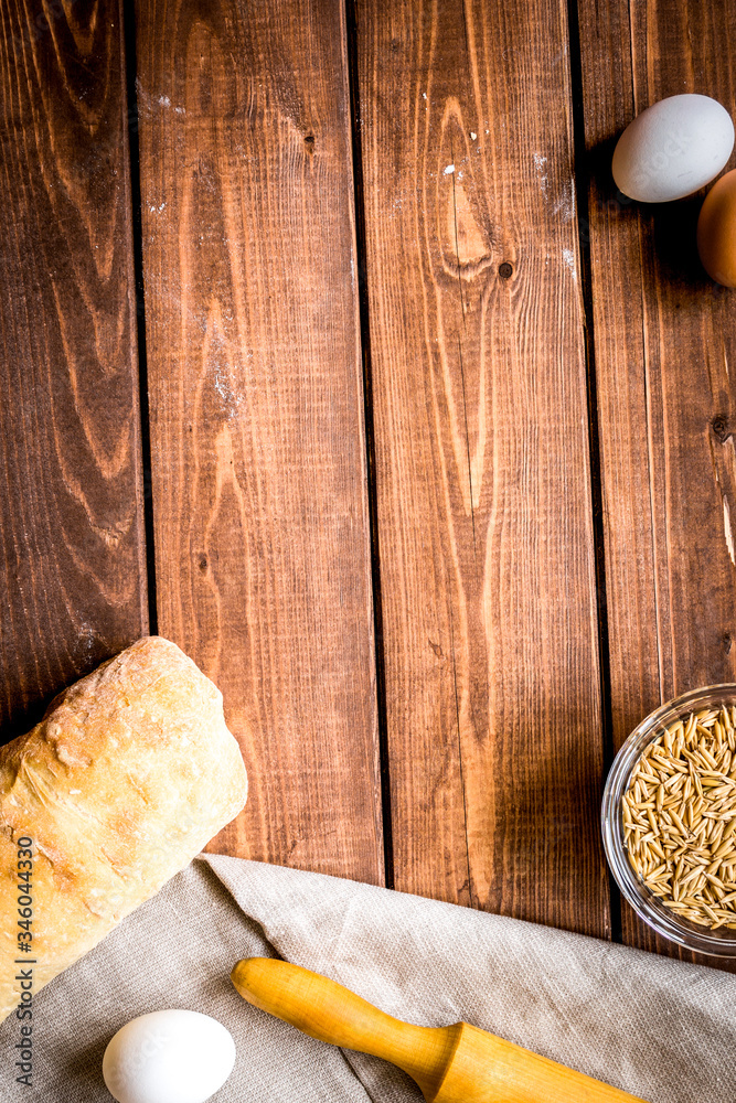 Dried crumbs with bread on kitchen table background top view mokeup