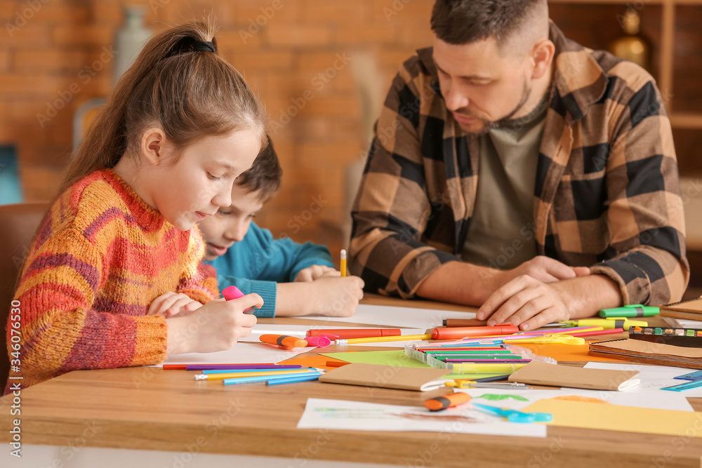 Drawing teacher giving optional classes at school