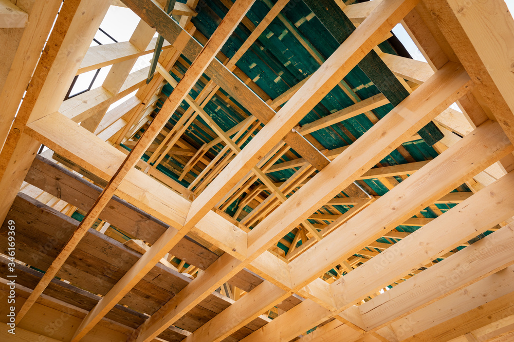 Interior frame of new wooden house under construction