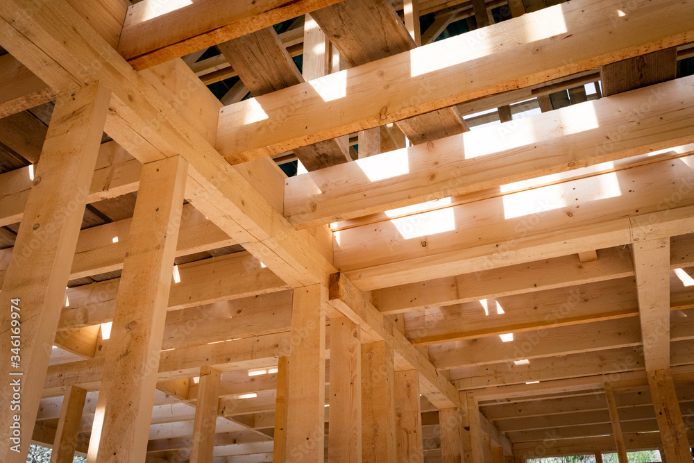 Interior frame of new wooden house under construction