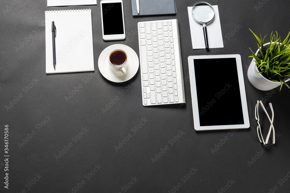 Top view of workplace with digital devices