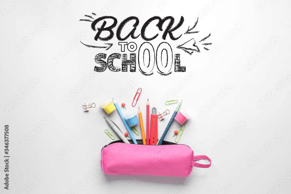 Pencil case with stationery and text BACK TO SCHOOL on white background