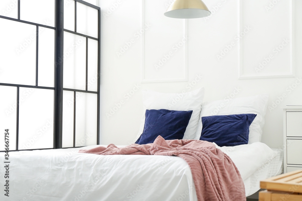 Interior of modern comfortable bedroom