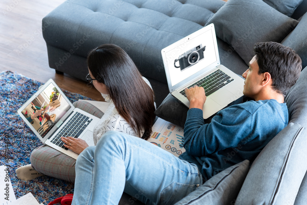 Couple spend time at home during lock down attend course online for their own interest, woman learni