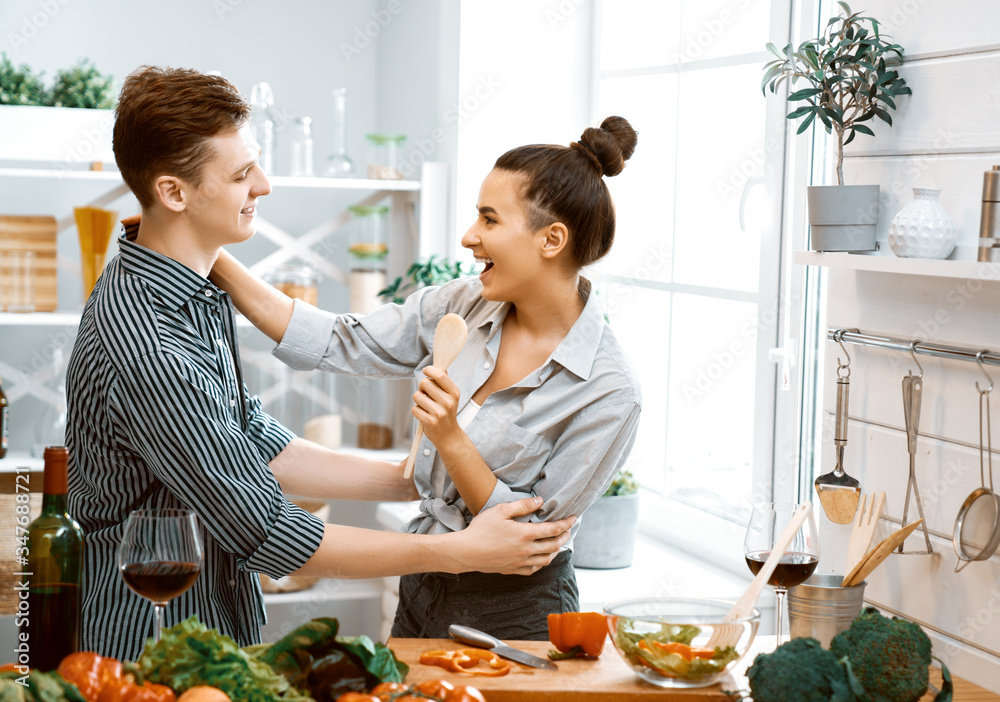 loving couple is preparing the proper meal