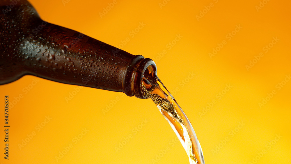 pouring beer from bottle